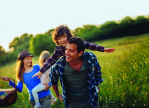 Photo Of A Happy Family Going For Picnic